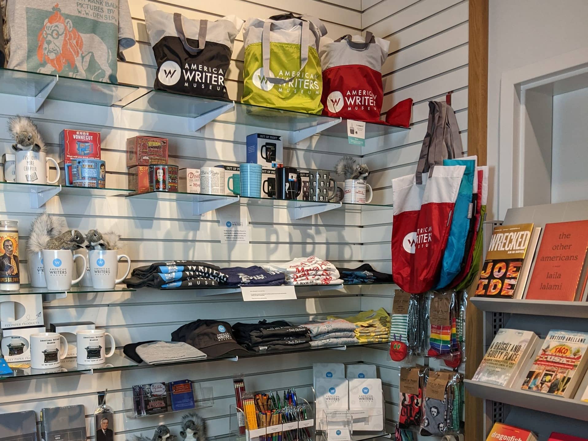 The retail shop at the American Writers Museum in Chicago. Great gifts including hats, t-shirts, tote bags, and mugs are on display and available online.